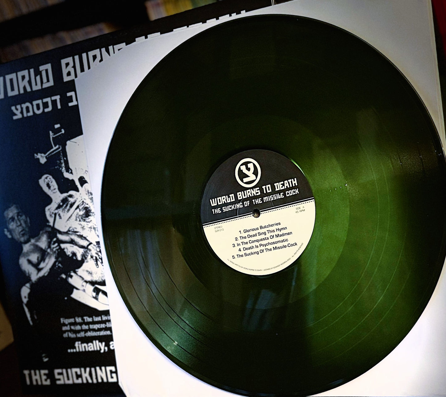 WORLD BURNS TO DEATH – The Sucking Of The Missile Cock LP